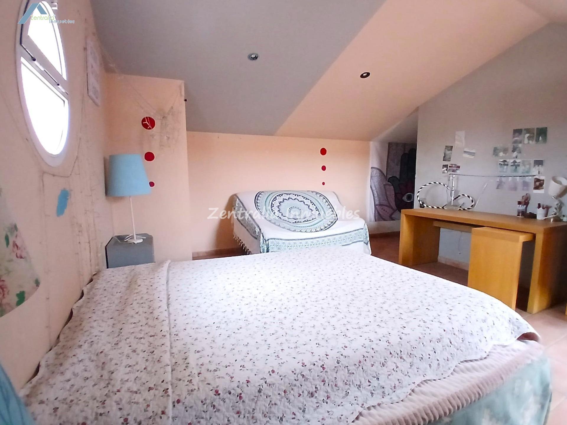 VIVIENDA UNIFAMILIAR CON JARDÍN PRIVADO